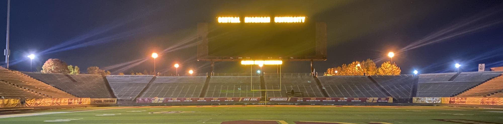 empty football stadium at night under the lights Honolulu