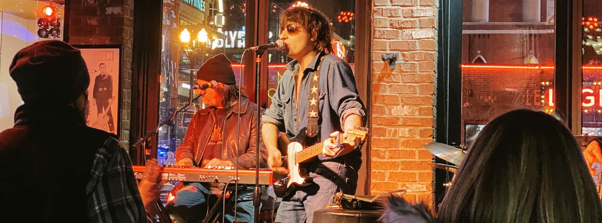 bar singer on guitar in Honolulu
